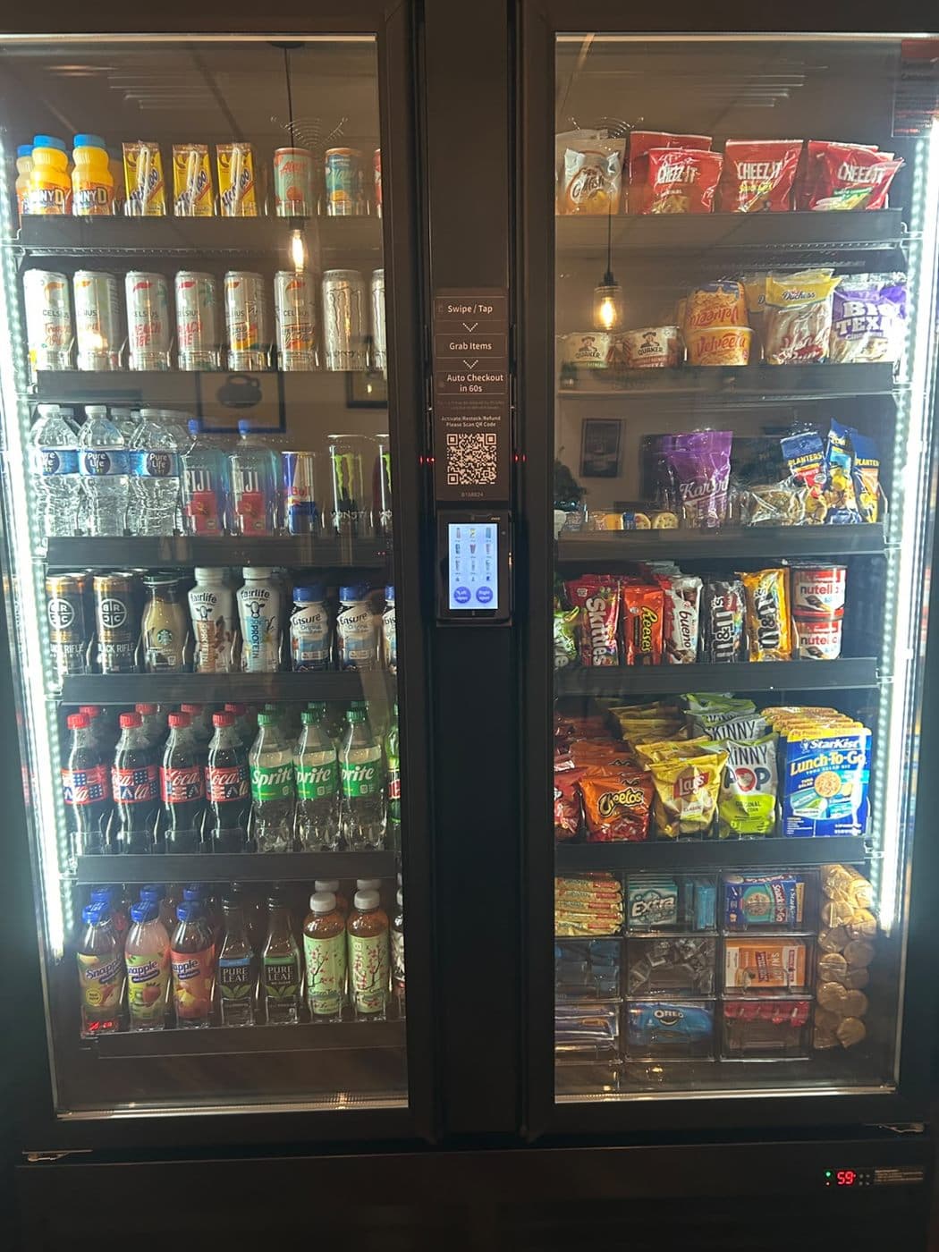 Client-supplied dual-door smart machine stocked with snacks and beverages
